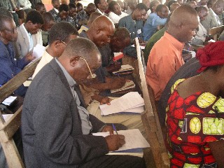 Pastors take note during conference