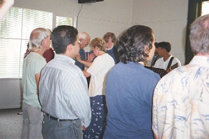 Julie praying at Sandringham Christian Family Church 