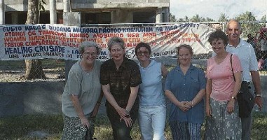 YMG Team in front of banner at Lagao Stadium