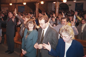 Julie & Gloria Kramer with interpreter in Christian Life Centre in Poland