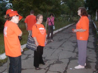 Team members pray during Prayer Walk