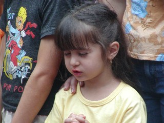Children pray to accept Jesus at street outreach