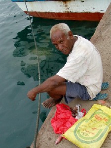 Fisherman by the sea