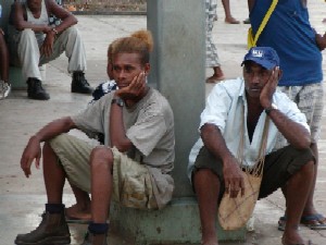 Men waiting on the edge of the Market