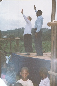 Julie preaching with interpreter