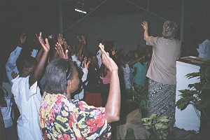 Julie preaching at Conference