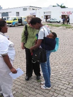 Julie and Msinda pray